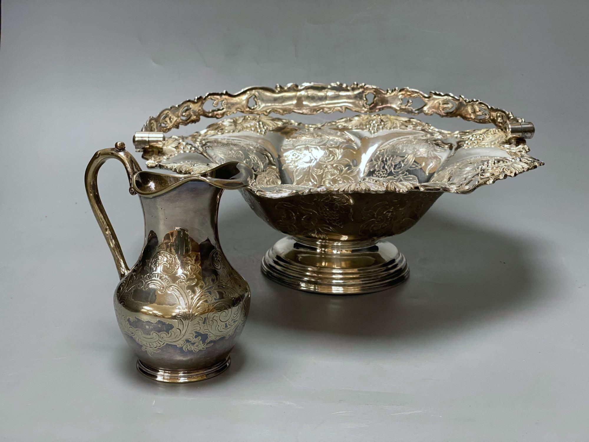 A silver plated cake basket, with cast border, diameter 31cm, two plated trays and three other items